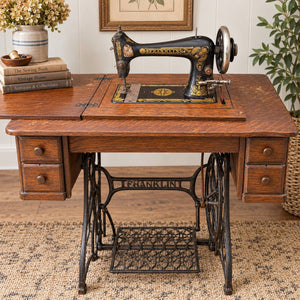 Franklin Treadle Sewing Machine in Oak Cabinet